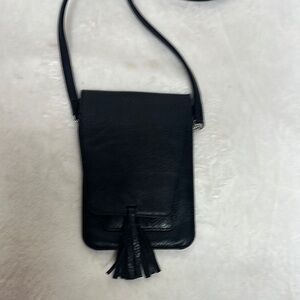 Stylish Black Crossbody Bag with Tassel Detail